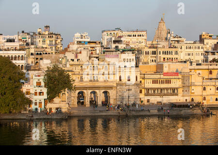 Gate Gangaur Ghat on Lake Pichola with historic centre, Udaipur, Rajasthan, India Stock Photo