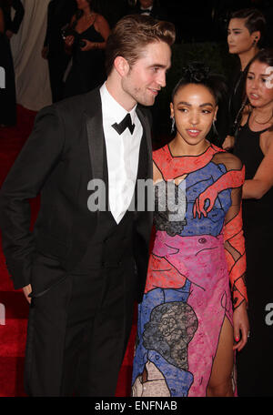 New York, , USA. 4th May, 2015. Actor ROBERT PATTINSON and singer FKA TWIGS attend the Costume Institute Benefit gala celebrating the opening of the new exhibit of 'China: Through the Looking Glass' held at the Metropolitan Museum of Art. Credit:  Nancy Kaszerman/ZUMAPRESS.com/Alamy Live News Stock Photo