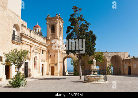 Courtyard with cypress, Chapel of the Blessed Virgin Mary at St. Mary Church, Mellieha, Malta Stock Photo