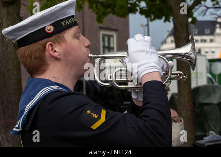 Copenhagen, Denmark. 5th May, 2015. A marine soldier plays during a ceremony the Memorial Anchor in Nyhavn, Copenhagen, for fallen sailors and veterans during WWWII. The Crown Prince laid a wreath at the anchor Credit:  OJPHOTOS/Alamy Live News Stock Photo