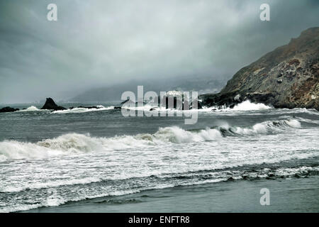 Big wave crashes on to the shore Stock Photo Alamy