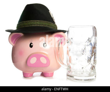 sad piggy bank wearing beer festival hat and empty pint cutout Stock Photo
