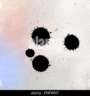Ink spot on colored textured paper Stock Photo