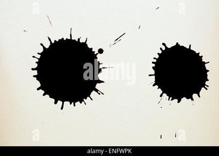 Ink spot on textured paper Stock Photo