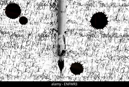 Antique pen on scratched and ink spot Stock Photo
