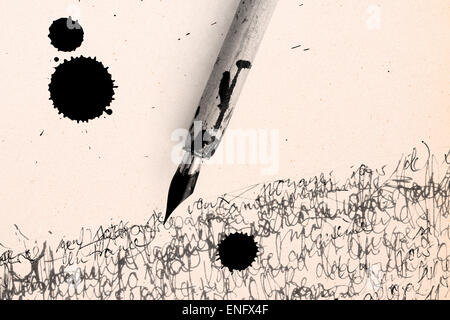 Antique pen on scratched and ink spot Stock Photo