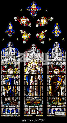 East Window at St Cuthberts Church Amble with St Cuthbert and Eider Ducks in the Left Panel Northumberland England Stock Photo