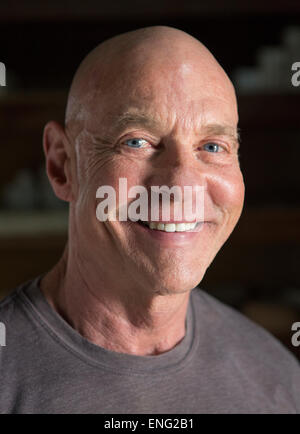 Close up of smiling face of older Caucasian man Stock Photo
