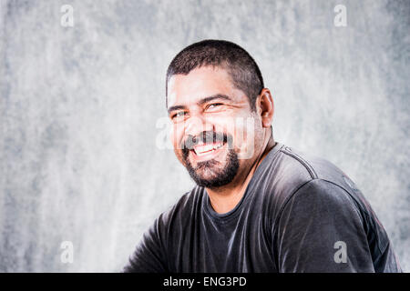 Close up of smiling Hispanic man Stock Photo