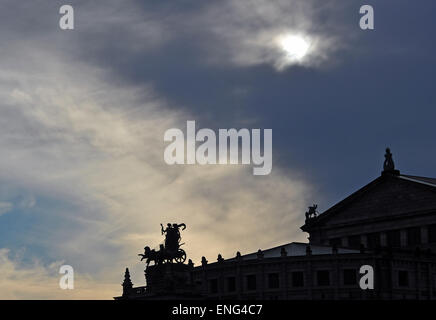 Dresden, Germany. 04th May, 2015. The suns sets behind the quadriga on the Semper Opera in Dresden, Germany, 04 May 2015. Photo: MATTHIAS HIEKEL/dpa/Alamy Live News Stock Photo