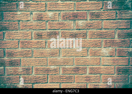 Brickwall patern made up of orange bricks with a vintage effect Stock Photo