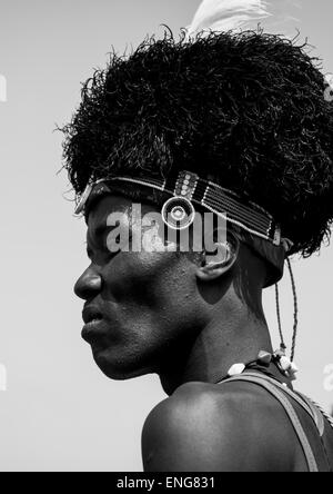 Turkana Tribesman With Headwear Made Of Ostrich Black Feathers, Turkana Lake, Loiyangalani, Kenya Stock Photo