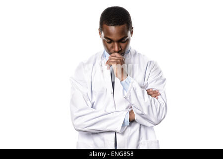 Worried african cardiologist or male doctor looking down deep in thought with a serious concerned expression, isolated on white Stock Photo