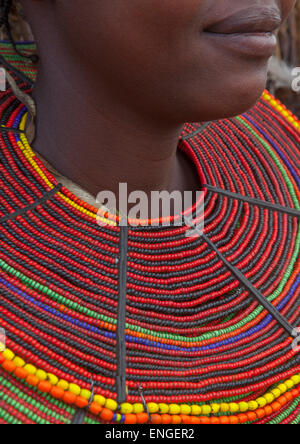 A Pokot Woman Wears Large Necklaces Made From The Stems Of Sedge Grass, Baringo County, Baringo, Kenya Stock Photo