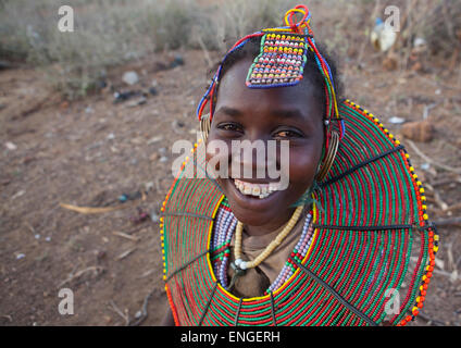 A Pokot Girl Wears Large Necklaces Made From The Stems Of Sedge Grass, Baringo County, Baringo, Kenya Stock Photo