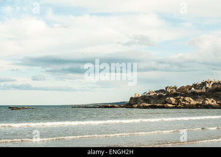 Houses at the end of the shore in St Andrews beach on a beautiful sunny day, Scotland Stock Photo