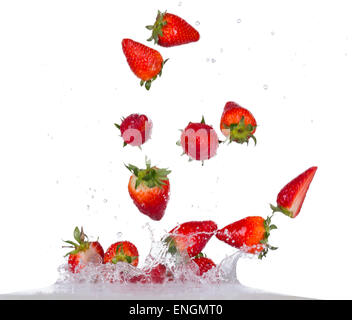 Fresh strawberries in water splash isolated on white backround Stock Photo