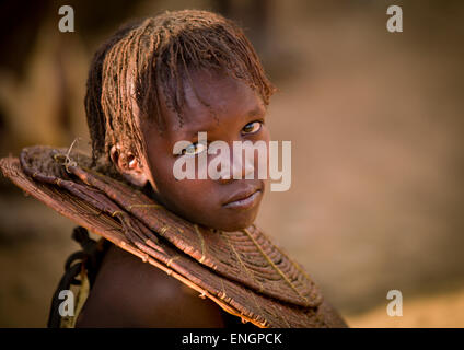 A Pokot Girl Wears Large Necklaces Made From The Stems Of Sedge Grass, Baringo County, Baringo, Kenya Stock Photo