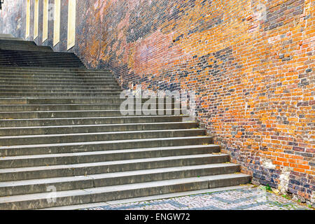 Stairs in front of an old brickwall seen in the historic center in Prague Stock Photo