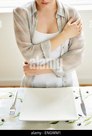 Woman refusing food Stock Photo