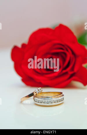 Two Golden Wedding Rings on table macro shot Stock Photo