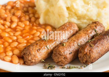 traditional bangers mash and baked beans but vegetarian style twist on the theme Stock Photo