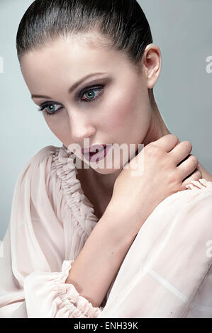 Beauty portrait of young woman looking sad Stock Photo