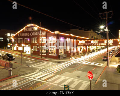 Monterey Canning Company building attraction lit up at night Cannery Row Monterey California USA Stock Photo