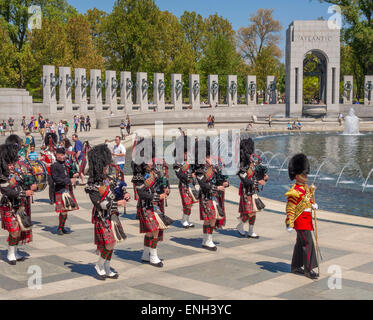 WASHINGTON, DC, USA - British Army's 1st Battalion Scots Guards Pipes and Drums marching at World War Two Memorial. Stock Photo