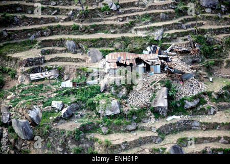 Kathmandu, Nepal. 4th May, 2015. The rubble of a home destroyed by a massive earthquake view by a U.S. Marine helicopter during a reconnaissance mission to survey the outlying areas of Nepal May 4, 2014 outside Kathmandu. Credit:  Planetpix/Alamy Live News Stock Photo