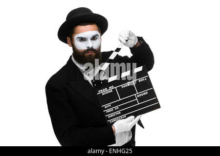 man in the image mime with movie board Stock Photo