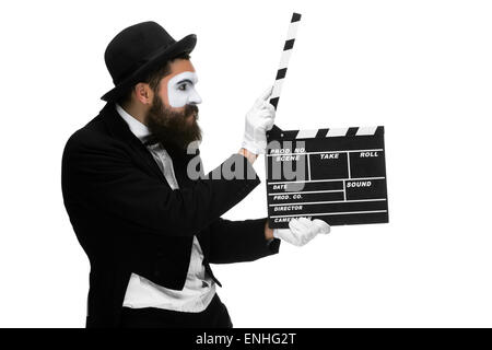 man in the image mime with movie board Stock Photo