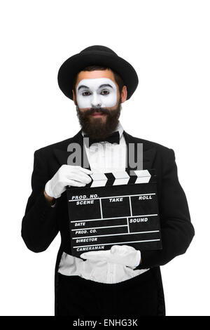 man in the image mime with movie board Stock Photo