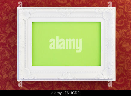 White Frame on dark red with green for your copy Stock Photo