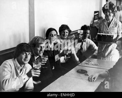 Miners enjoy a pint in works canteen after end of 90 dry minutes, after sympathy strike in support of a waitresses dispute at Bellshall, June 1969. Stock Photo