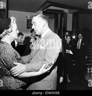 Val Parnell, right, British television producer and theatrical impresario, pictured speaking with Gracie Fields, british actress, singer and comedienne and star of both cinema and music hall, September 1955. Stock Photo