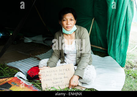 Tundikhel, Kathmandu, Nepal. 4th May, 2015. Earthquake victims in a food queue at a relief camp in Tundikhel, kathmandu, Nepal on monday, 4th may 201 Credit: © abhishek bali/Alamy Live News  Stock Photo