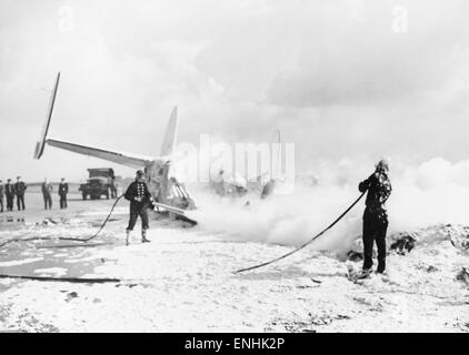 Troop carrying 4 engined Avro York, which crashed at Stanstead Airport in Essex, when attempting to take off, 22nd September 1954. Carrying 44 Welsh Guards, the plane lost a wheel on take off, skidded across the airfield with its engines ablaze and crashe Stock Photo