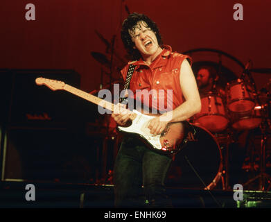 British blues guitarist and singer Gary Moore performing in concert at the Hammersmith Odeon, London. February 1984. Stock Photo