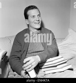 Pat Boone 22, American singer, actor, writer and student has sold over 14,000,000 records in two years, has recently arrived in the UK for a series of television and variety engagements. pictured Wednesday 26th December 1956. Stock Photo