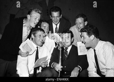 Everton football players cut a disc. Jimmy Gabriel,with his daughter ...