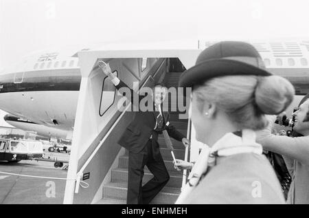 Head of Laker Airways Freddie Laker in jubilant mood at Gatwick airport on the day of the inaugural flight of his transatlantic Skytrain service from Gatwick airport, London to JFK, New York. The flight can seat 345 passengers and will cost £59 for a tick Stock Photo