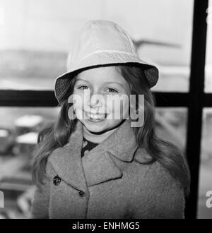 Lena Zavaroni, aged 10, pictured at London Heathrow Airport, to catch flight to Glasgow, March 1974. Stock Photo