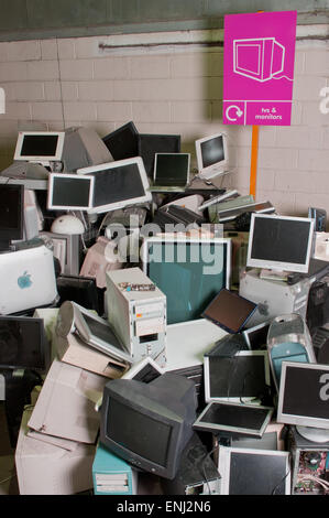 discarded computers in a pile at dump Stock Photo