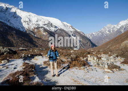 Female trekking near Kyanjin Gomba, Langtang, Nepal Stock Photo