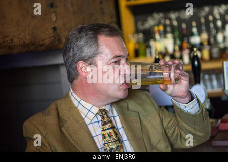 UKIP leader Nigel Farage takes a break in a pub after canvasing and leafleting in Kent ahead of May's general election. Stock Photo