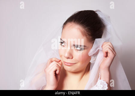 Portrait of a beautiful bride crying, closeup Stock Photo