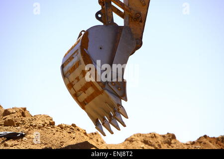 Close up view of a shovel of a excavator on a construction site Stock Photo