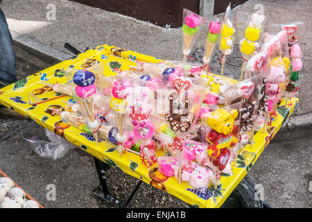 brightly colored cellophane wrapped novelty Valentine candies for sale on street corner San Cristobal de las Casas Chiapas Stock Photo