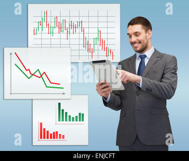 smiling buisnessman with tablet pc computer Stock Photo